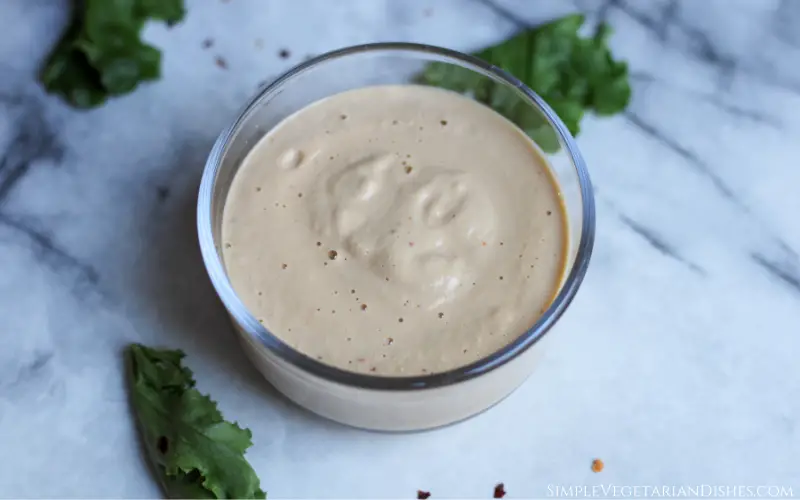 spicy cashew dressing in small glass bowl