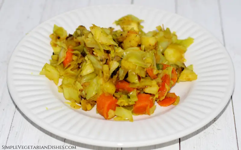 tikil gomen Ethiopian cabbage served on white plate