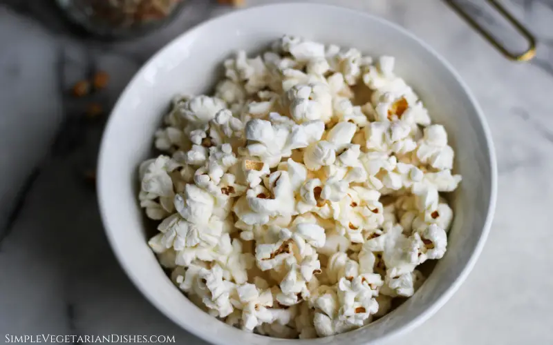 air fryer popcorn close up in white bowl