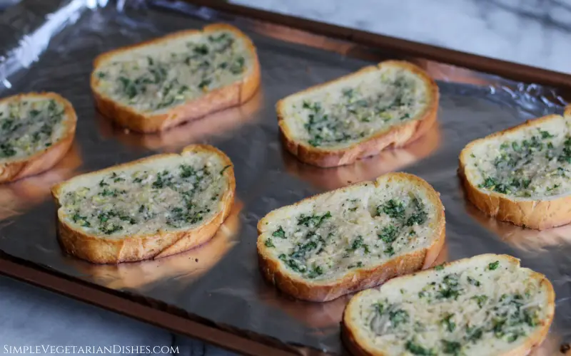 vegan garlic bread toasted on foil lined baking sheet