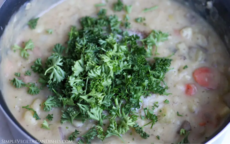 blended German potato soup with parsley and salt pepper nutmeg on top