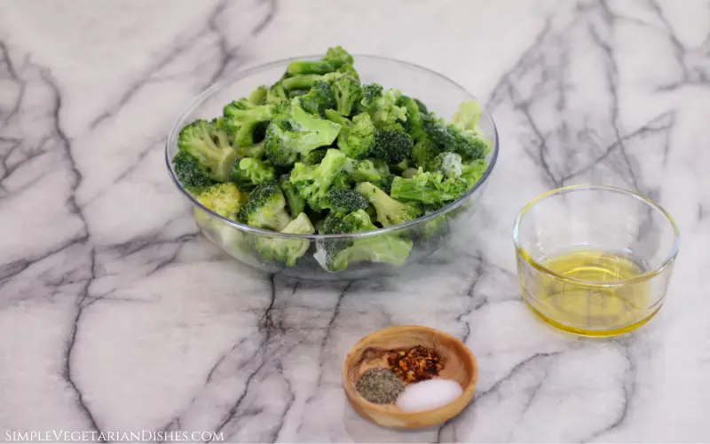 recipe ingredients in small bowls on white marble table