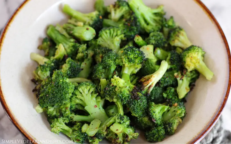 bowl of frozen broccoli cooked in the air fryer