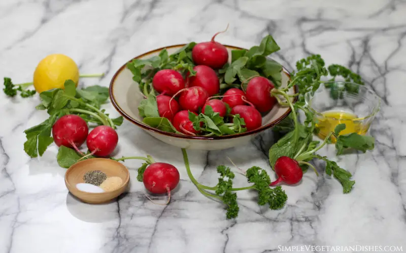 bowl of fresh radishes with ingredients to air fry them