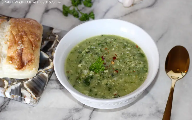 vegan spicy zucchini soup served with ciabatta roll